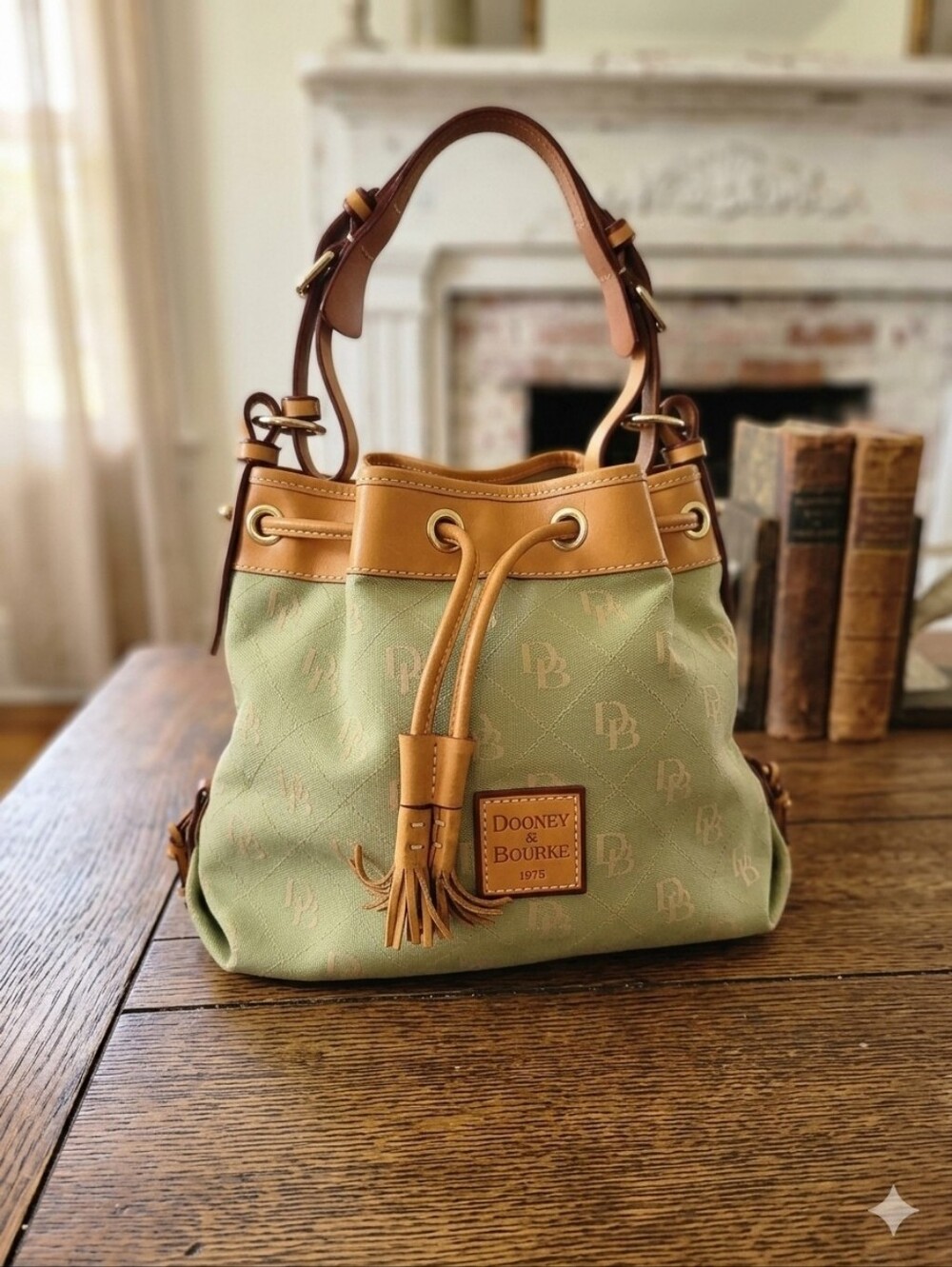 Dooney & Bourke Vintage Green DB Monogram Tassel Drawstring Bucket Bag